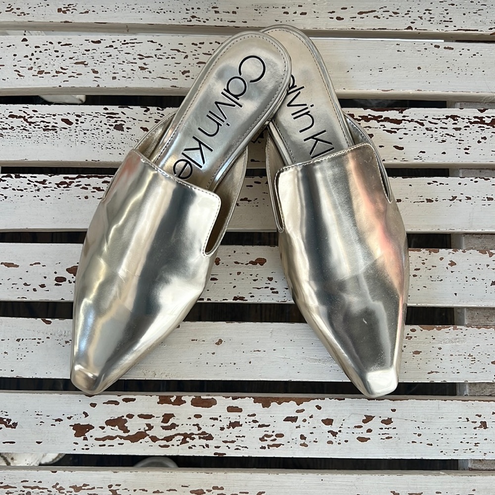 Calvin Klein gold mules size 10